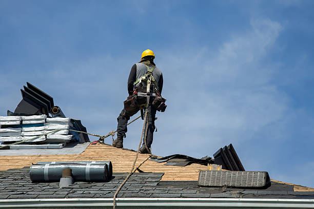 Professional Roofing technician working in Charles City, IA